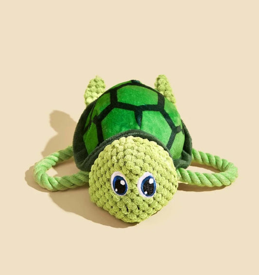 Tortuga de peluche con cuerdas